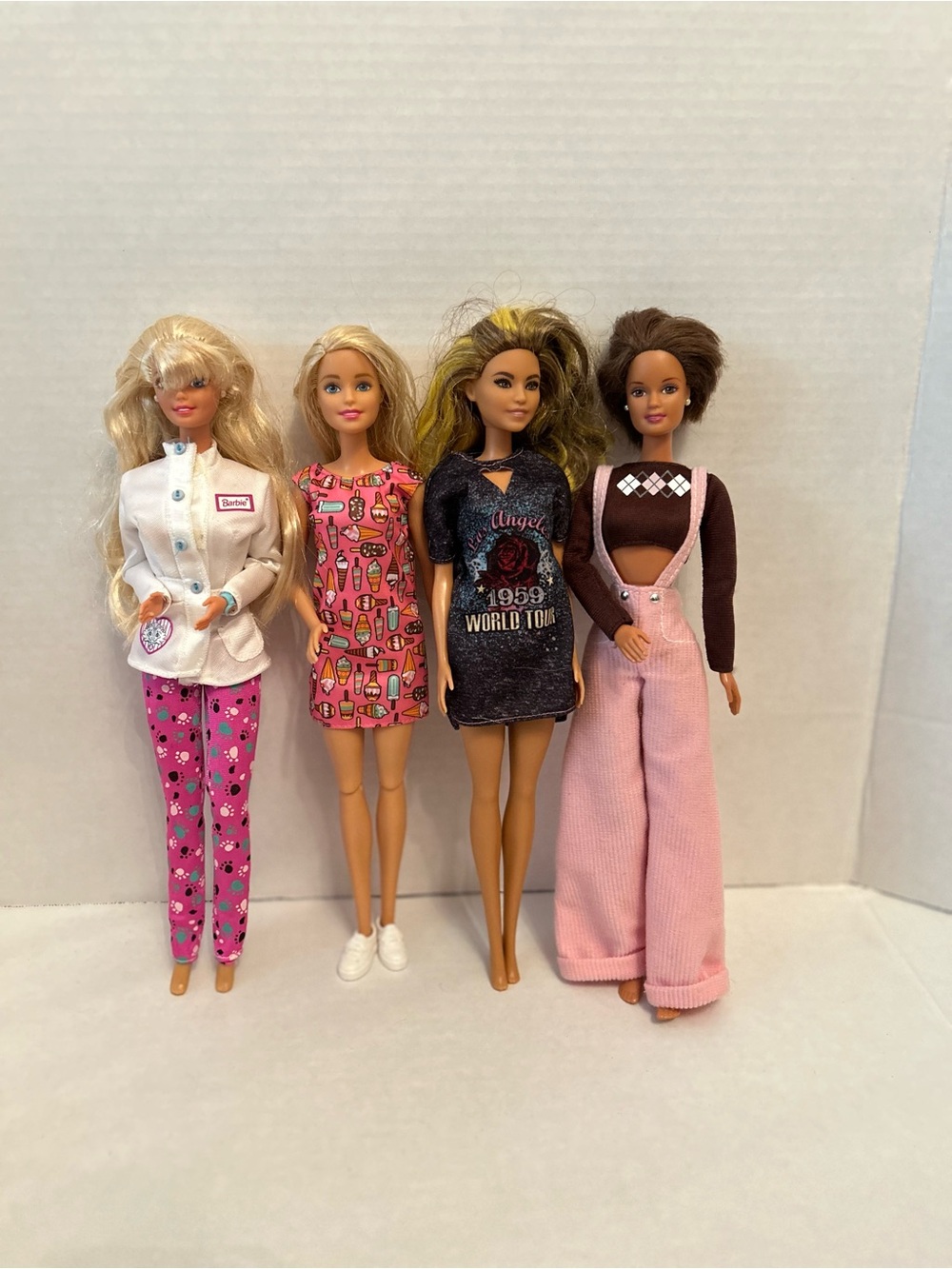Mixed Fashion Barbie Doll Lot - Pink, Black, White & Brown Outfits